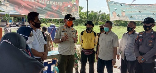 Tinjau Posko Covid-19, Pjs Bupati Rohil Ajak Petugas Gencar Laksanakan Sosialisasi